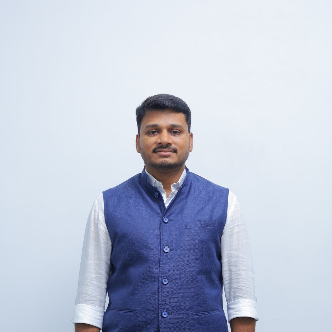 DINESH C