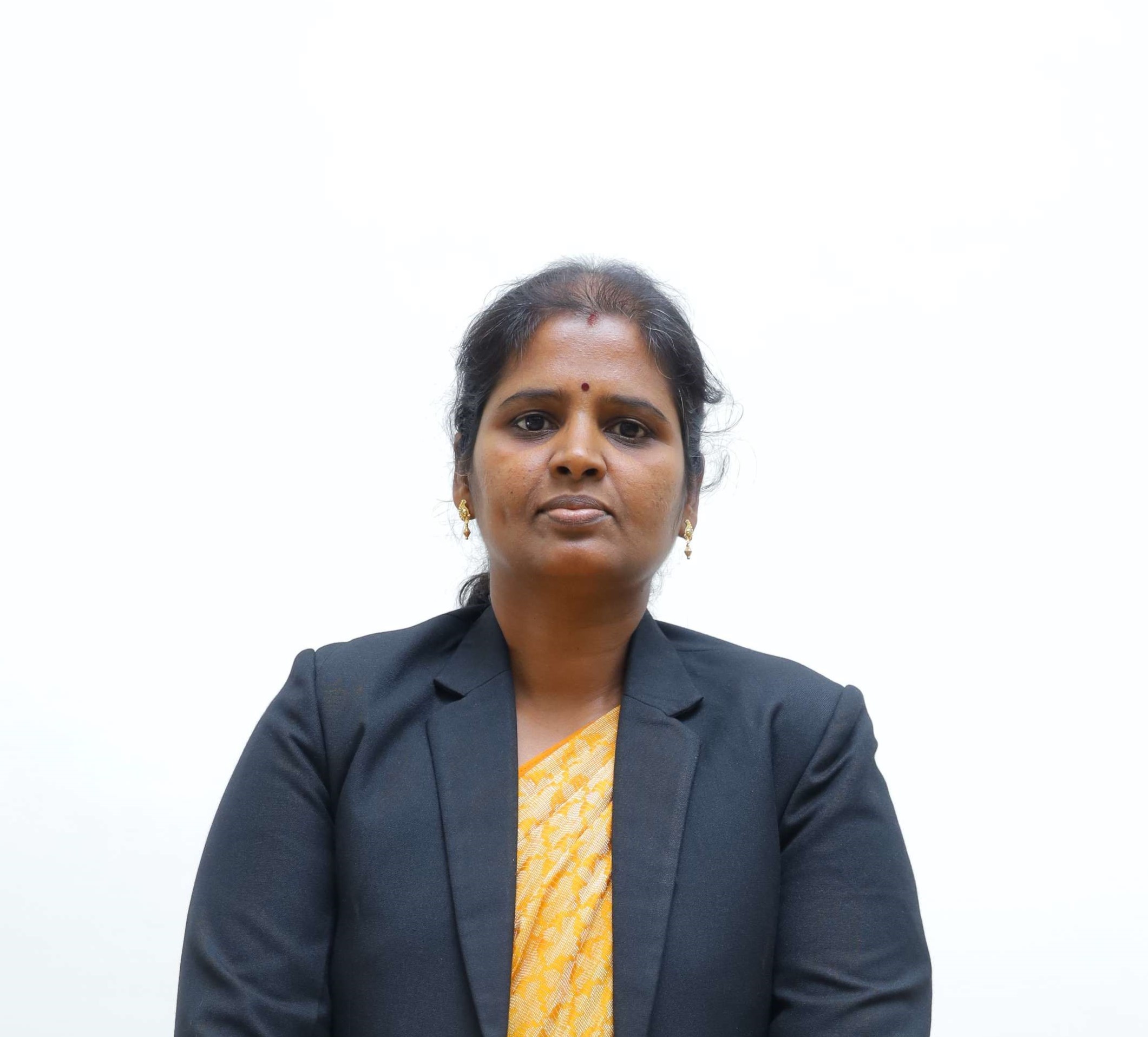 Dr. MENAHA R