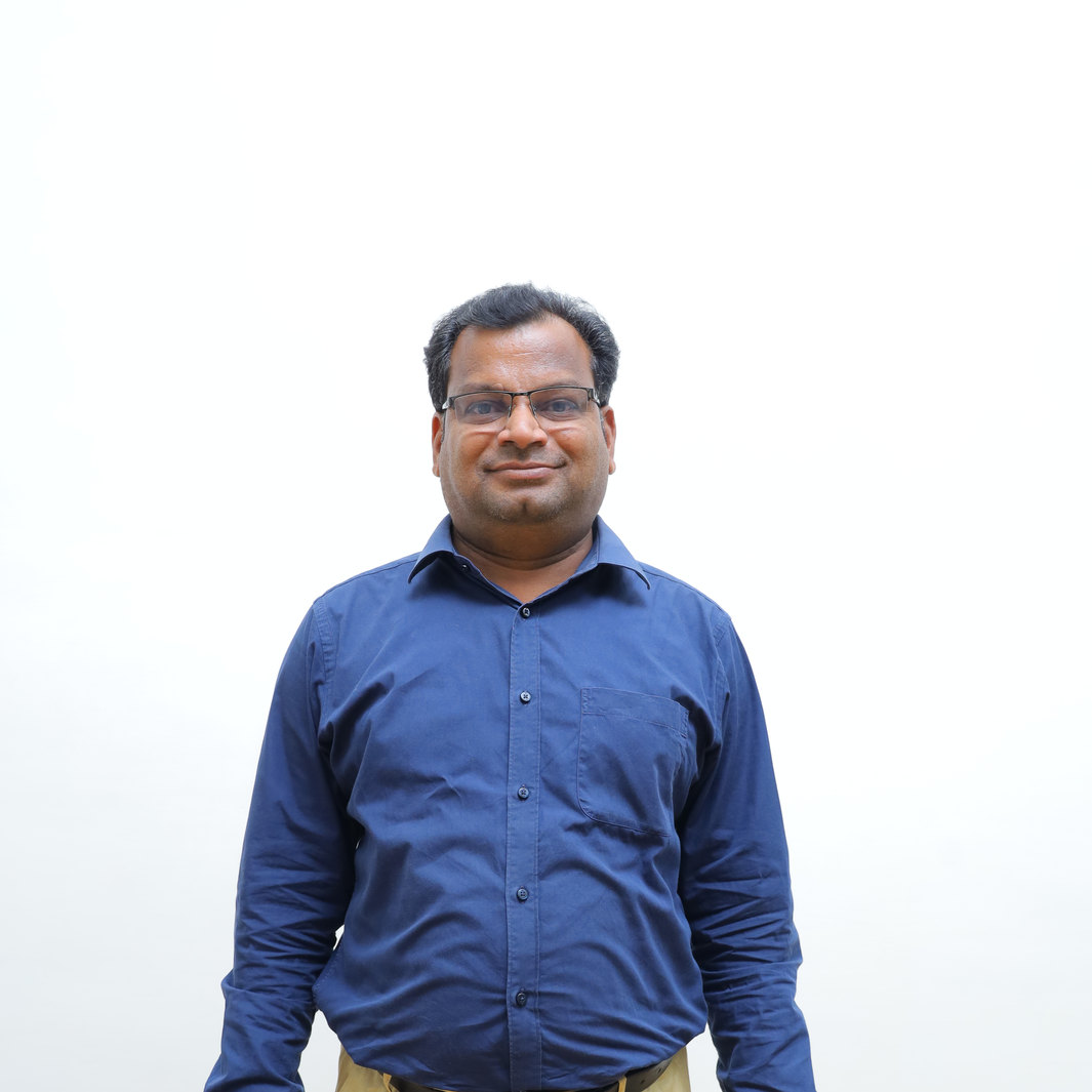 Dr. PARTHIBAN S